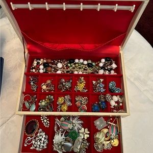 Vintage jewelry box filled with jewelry